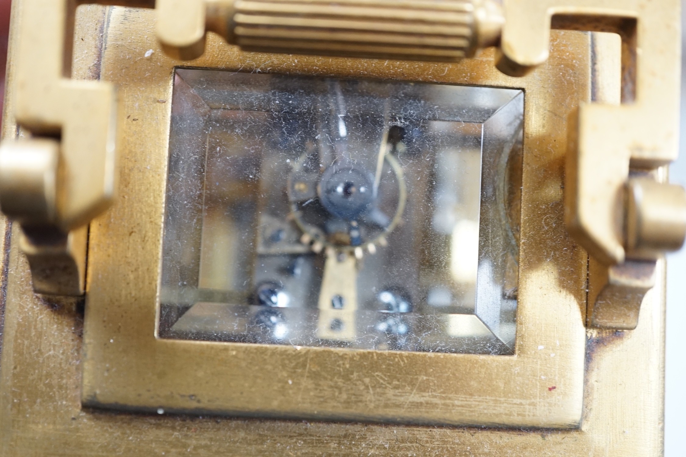 A 19th century French brass eight day carriage clock with alarm,. 12cm tall